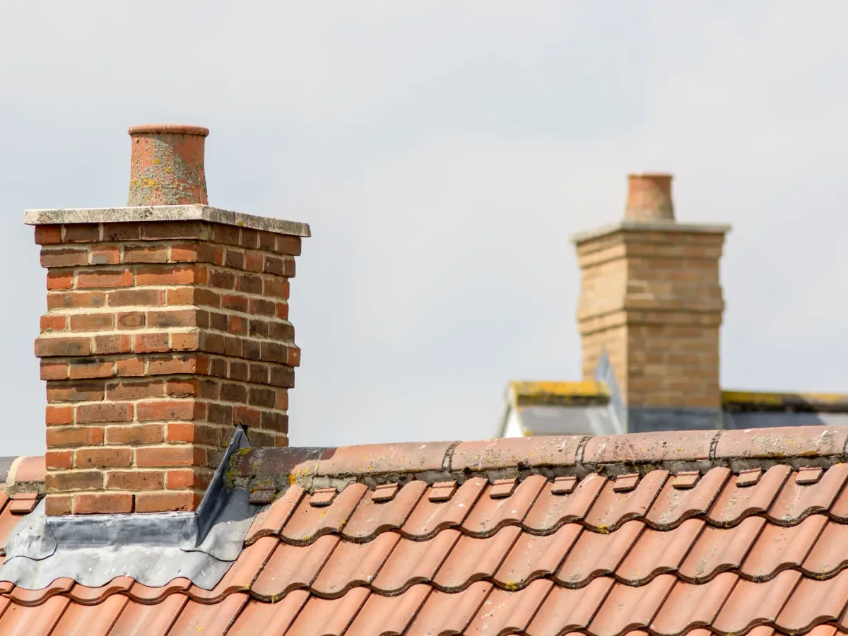 Chimney Repairs work on a roof