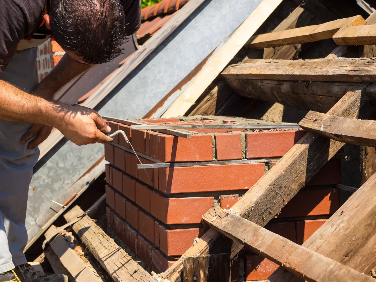 Chimney Repointing work on a roof